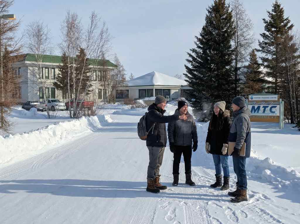 Students outside Arctic Marine Training in winter